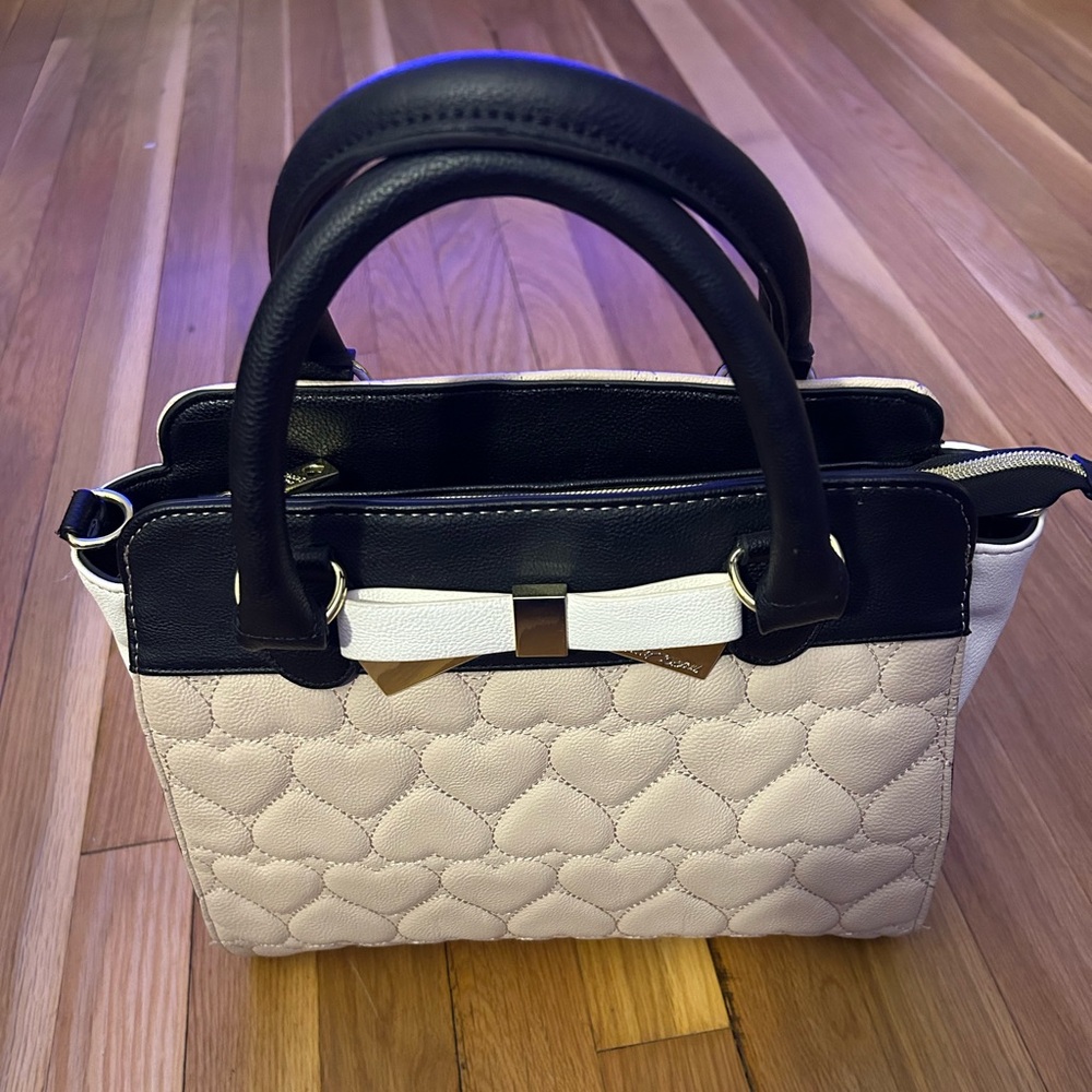 Used Betsey Johnson bag (tan, white, and black) with top zip closure